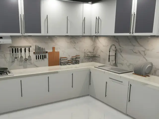 A kitchen with white cabinets and marble counter tops