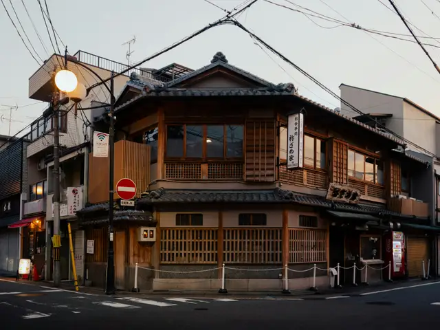 A street corner with a building on the corner