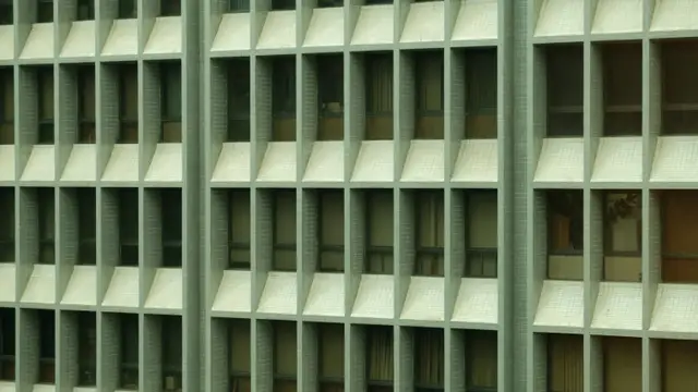 A close up of a building with lots of windows
