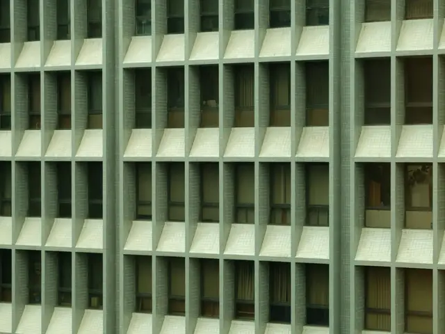 A close up of a building with lots of windows