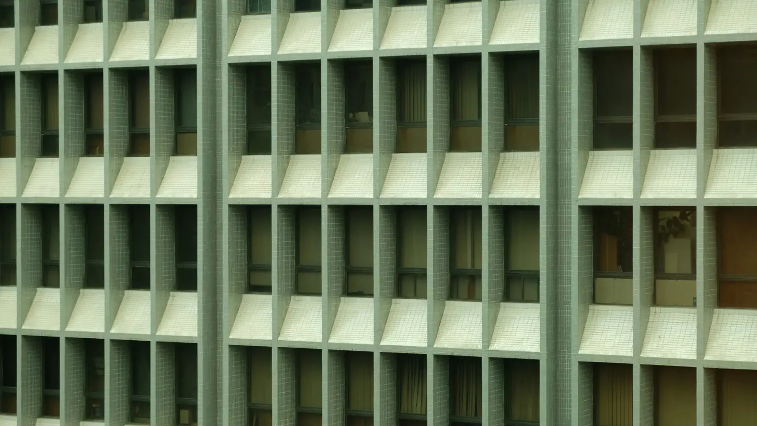 A close up of a building with lots of windows